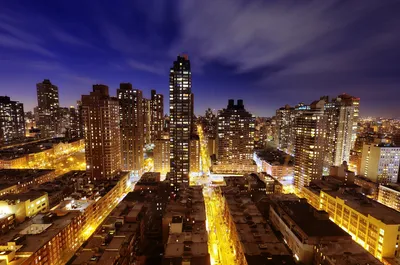 夜幕都市灯火 城市夜景 高楼林立 暖黄灯光 1080P